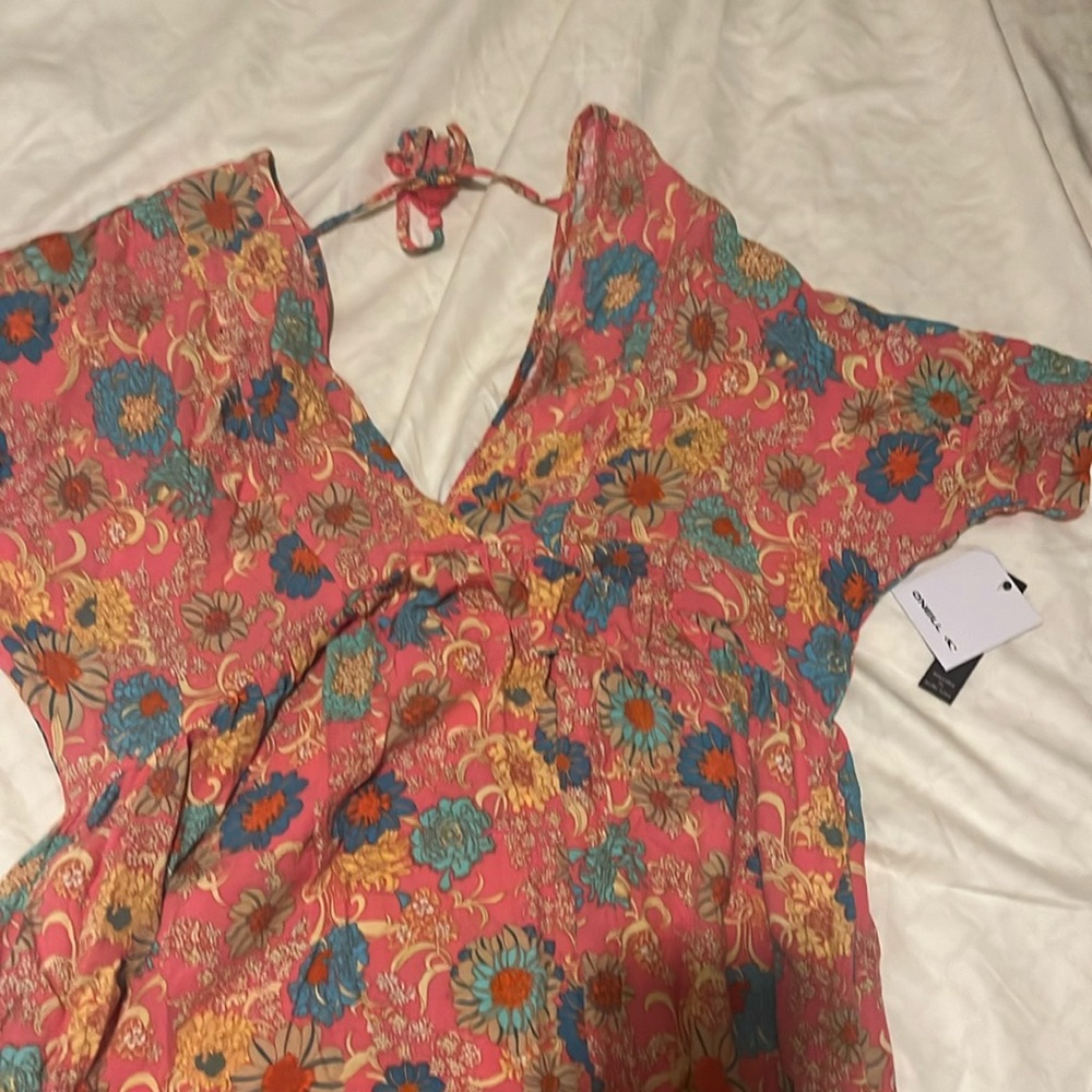 It’s a cute summer nice color flower dress new with tags medium brand O’Neill
